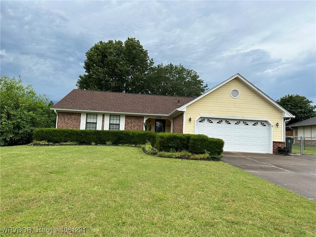 5108 S 94th St, Fort Smith, AR 72903 - single story home featuring brick siding, concrete driveway, and an attached garage