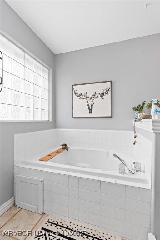full bath featuring a bath