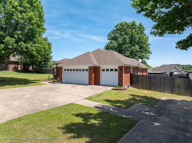ranch-style house with brick siding, concrete driveway, and an attached garage