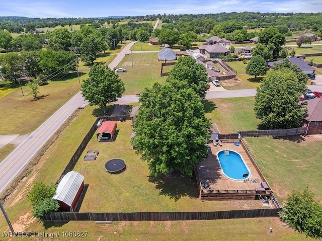 drone / aerial view of a pool area