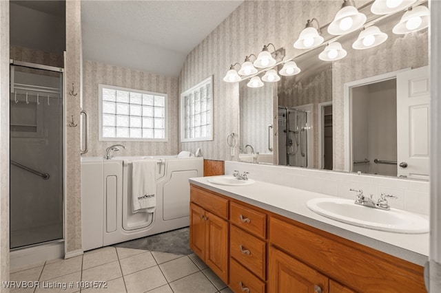 7004 Millennium Dr, Fort Smith, AR 72916 - bathroom with wallpapered walls, a shower stall, tile patterned flooring, double vanity, and a garden tub