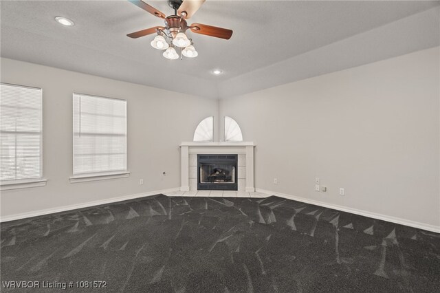 7004 Millennium Dr, Fort Smith, AR 72916 - unfurnished living room featuring carpet floors, a fireplace, plenty of natural light, and recessed lighting