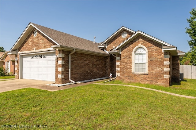 7004 Millennium Dr, Fort Smith, AR 72916 - ranch-style home with an attached garage, brick siding, concrete driveway, and roof with shingles