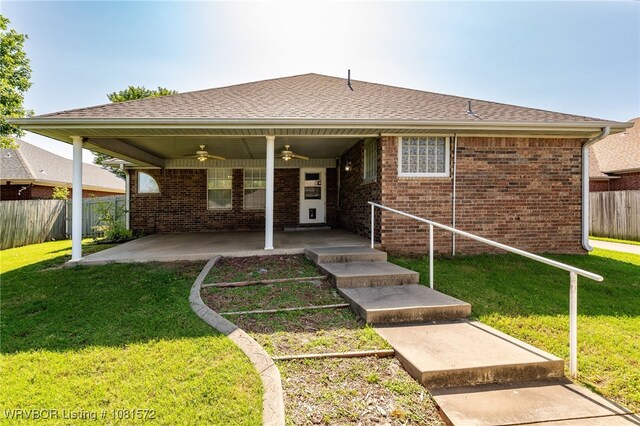 7004 Millennium Dr, Fort Smith, AR 72916 - view of front of property with a ceiling fan, a patio area, brick siding, and a shingled roof