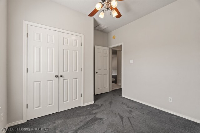 7004 Millennium Dr, Fort Smith, AR 72916 - unfurnished bedroom with dark carpet, a closet, and ceiling fan