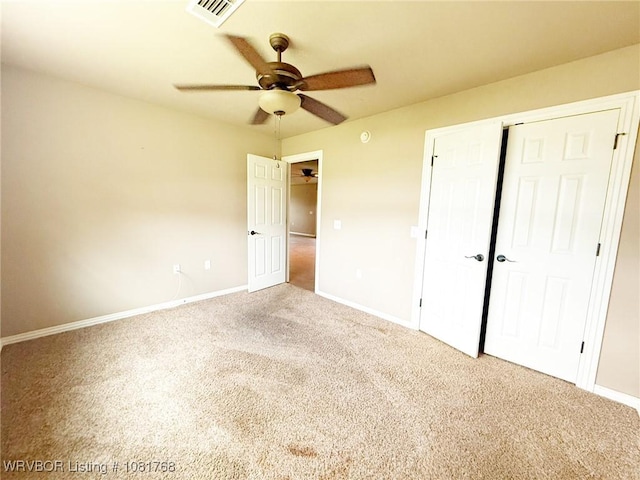 900 S Mattox Ln, Sallisaw, OK 74955 - unfurnished bedroom featuring carpet floors, a closet, and a ceiling fan