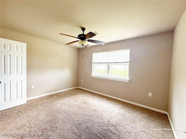 900 S Mattox Ln, Sallisaw, OK 74955 - unfurnished room with carpet floors and a ceiling fan