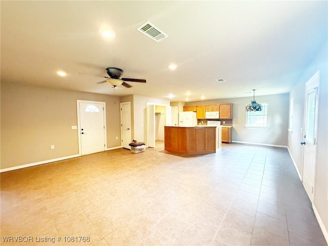 900 S Mattox Ln, Sallisaw, OK 74955 - unfurnished living room with recessed lighting and a ceiling fan