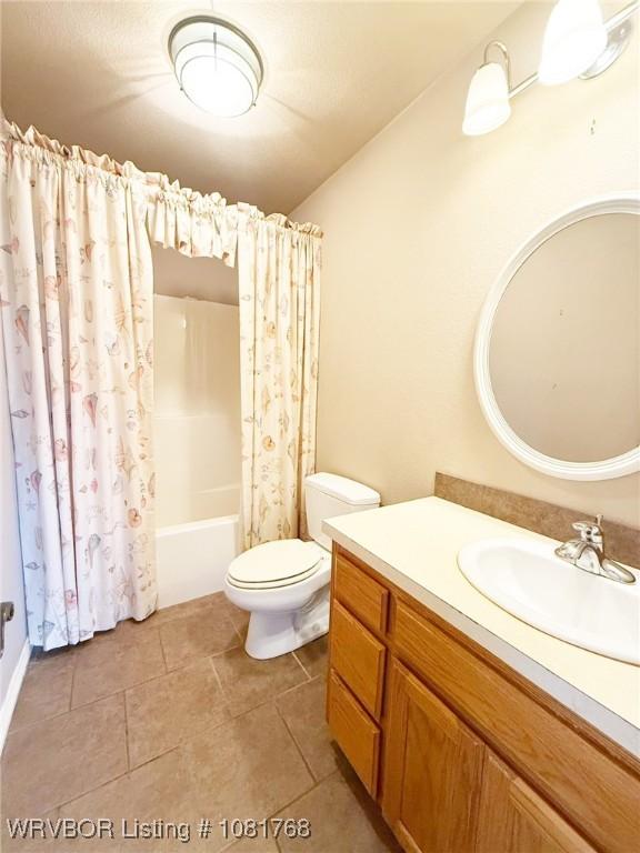 900 S Mattox Ln, Sallisaw, OK 74955 - full bath with vanity, shower / bath combination with curtain, and tile patterned floors