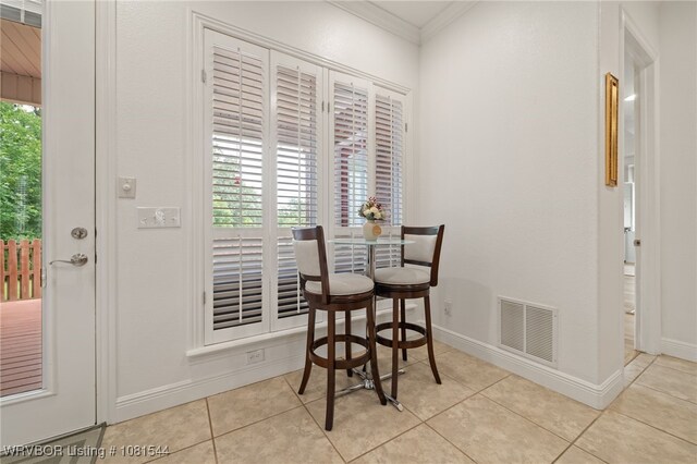 38 Jeffrey Way, Fort Smith, AR 72903 - dining room featuring crown molding, baseboards, and tile patterned floors