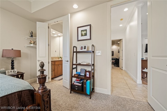 38 Jeffrey Way, Fort Smith, AR 72903 - bedroom with light tile patterned floors, recessed lighting, connected bathroom, baseboards, and light colored carpet