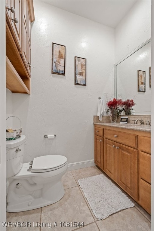 38 Jeffrey Way, Fort Smith, AR 72903 - half bathroom featuring toilet, vanity, and tile patterned flooring