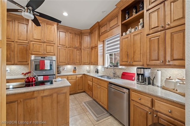 38 Jeffrey Way, Fort Smith, AR 72903 - kitchen featuring stainless steel appliances, a sink, backsplash, and a ceiling fan