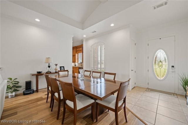 38 Jeffrey Way, Fort Smith, AR 72903 - dining space with healthy amount of natural light, crown molding, recessed lighting, baseboards, and light wood-type flooring