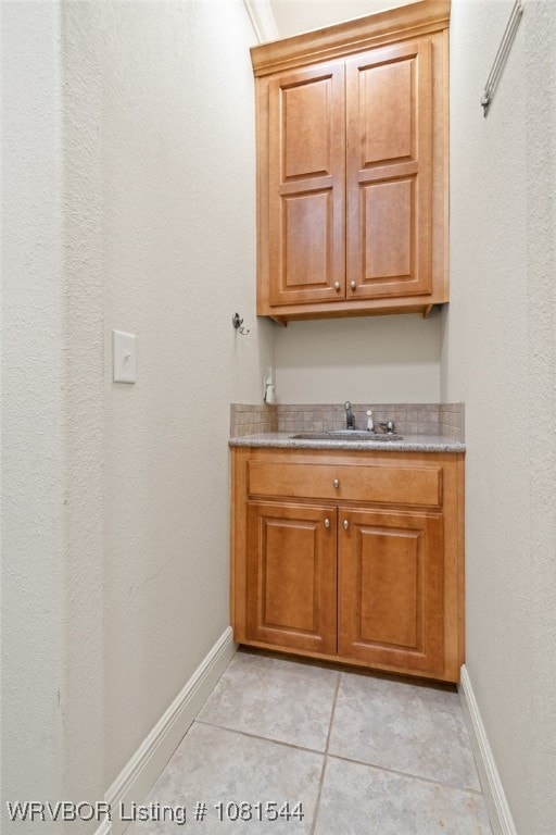 38 Jeffrey Way, Fort Smith, AR 72903 - bathroom featuring tile patterned flooring, baseboards, and vanity