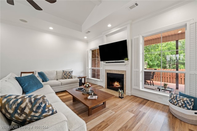 38 Jeffrey Way, Fort Smith, AR 72903 - living area with ceiling fan, a tiled fireplace, recessed lighting, wood finished floors, and ornamental molding