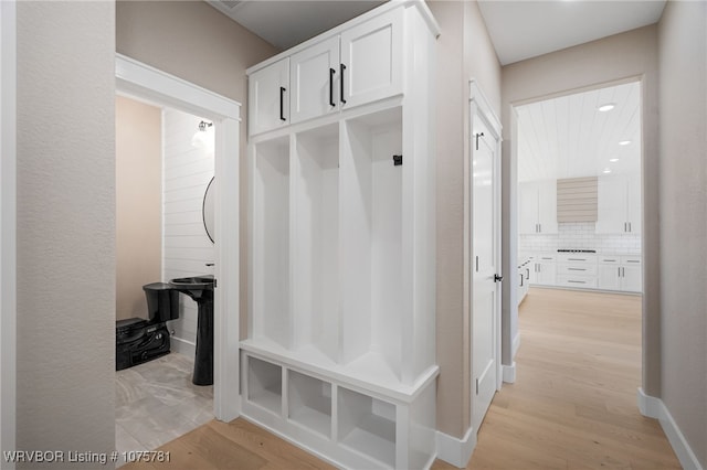 mudroom with light wood-type flooring