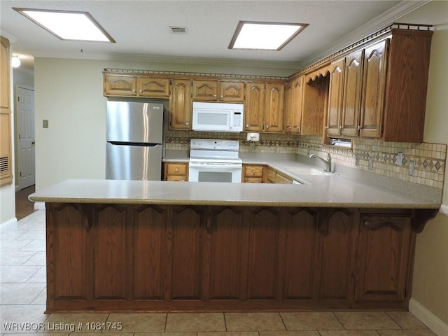 2211 Breckenridge Ter, Greenwood, AR 72936 - kitchen featuring white appliances, a peninsula, decorative backsplash, light tile patterned floors, and ornamental molding
