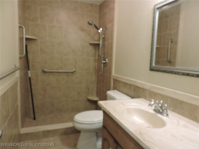 2211 Breckenridge Ter, Greenwood, AR 72936 - bathroom featuring a tile shower and vanity