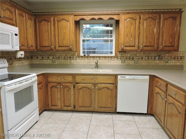 2211 Breckenridge Ter, Greenwood, AR 72936 - kitchen featuring white appliances, brown cabinetry, crown molding, tasteful backsplash, and light countertops
