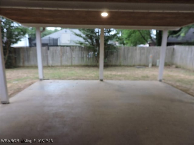 2211 Breckenridge Ter, Greenwood, AR 72936 - fenced backyard with a patio