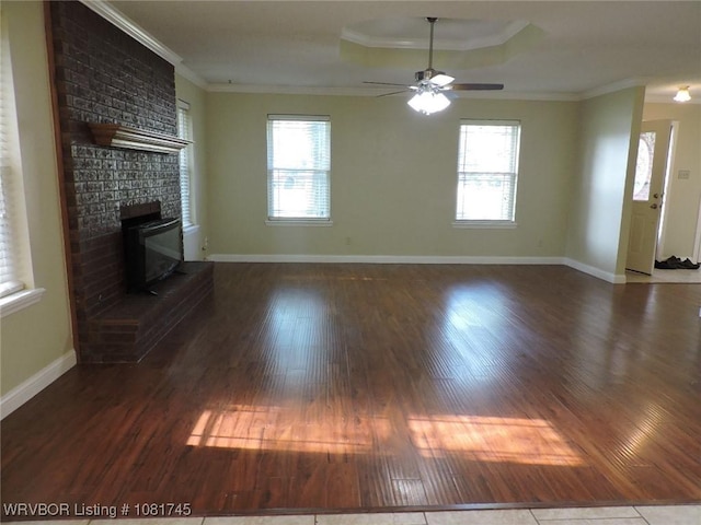 2211 Breckenridge Ter, Greenwood, AR 72936 - unfurnished living room with wood finished floors, ornamental molding, a raised ceiling, and a ceiling fan
