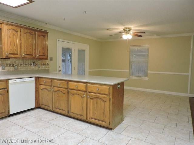 2211 Breckenridge Ter, Greenwood, AR 72936 - kitchen with white dishwasher, a peninsula, brown cabinets, tasteful backsplash, and ornamental molding