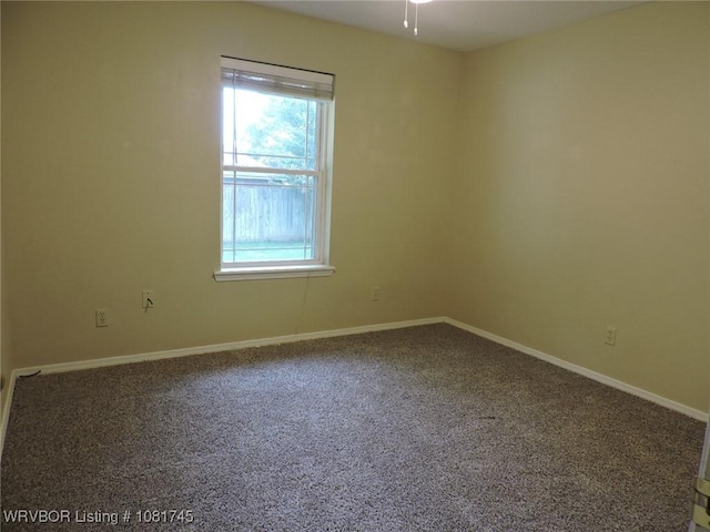 2211 Breckenridge Ter, Greenwood, AR 72936 - unfurnished room featuring healthy amount of natural light, carpet flooring, and a ceiling fan
