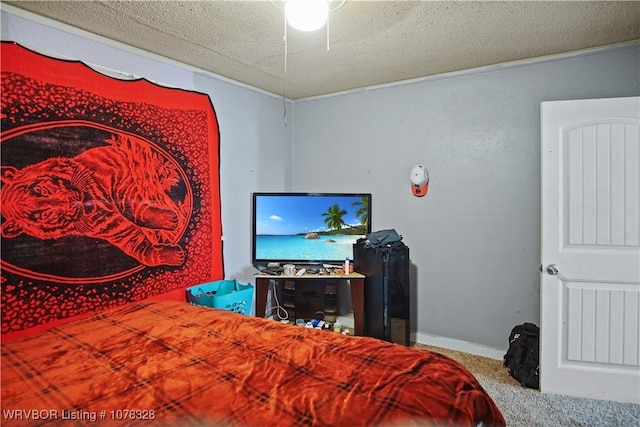 carpeted bedroom with a textured ceiling