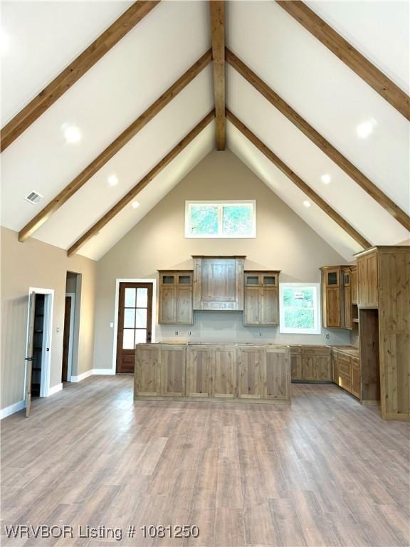 4457 Radio Tower Rd, Van Buren, AR 72956 - unfurnished living room featuring high vaulted ceiling, beam ceiling, light wood-style flooring, recessed lighting, and baseboards
