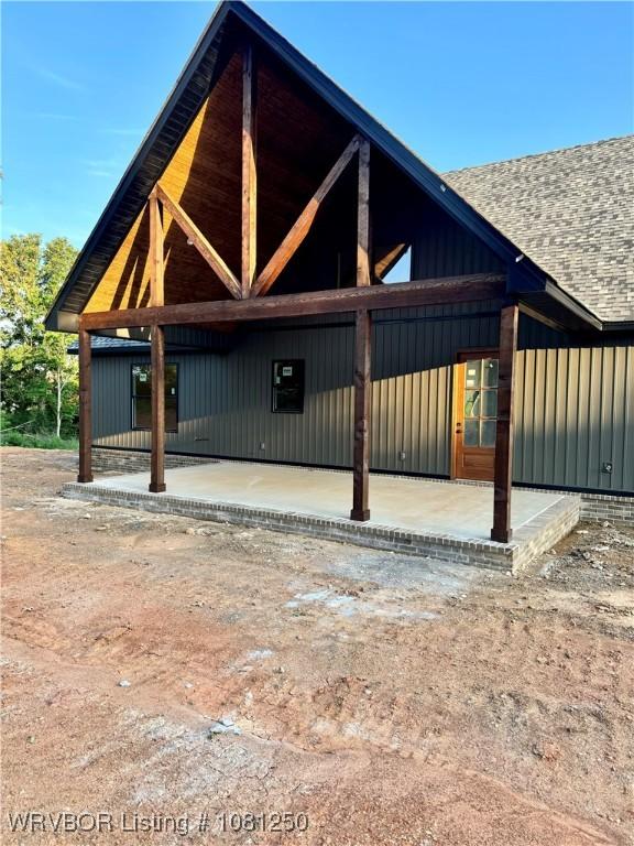 4457 Radio Tower Rd, Van Buren, AR 72956 - view of front of house featuring board and batten siding and a shingled roof