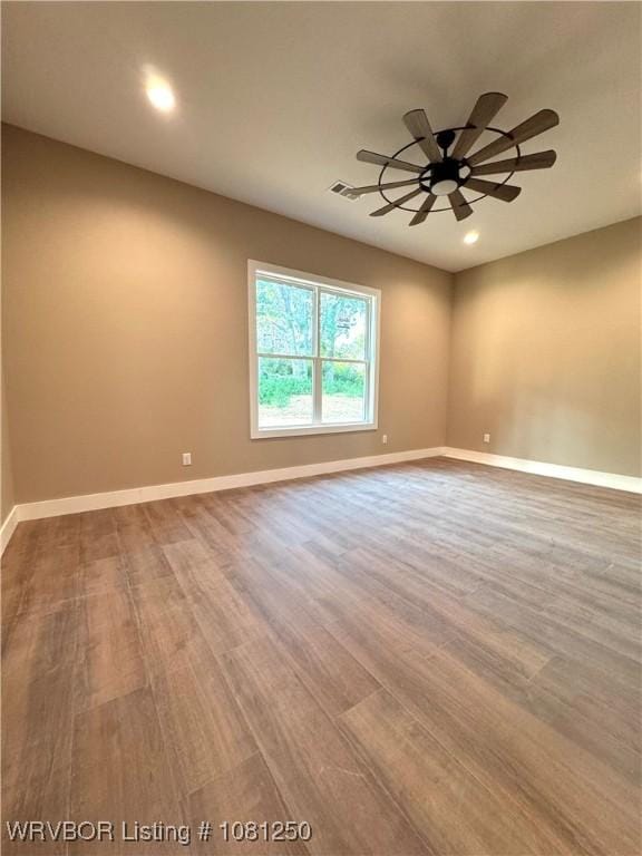 4457 Radio Tower Rd, Van Buren, AR 72956 - empty room with wood finished floors, recessed lighting, baseboards, and ceiling fan