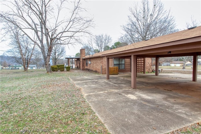 exterior space featuring a carport