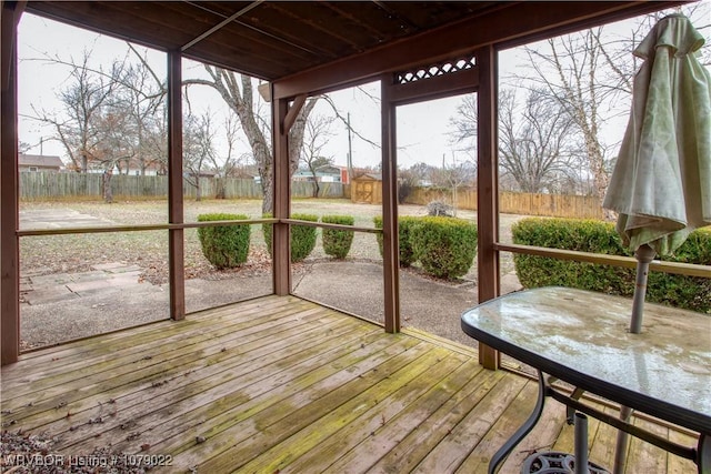 sunroom with plenty of natural light