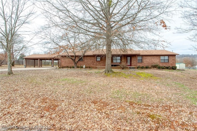 view of front of house featuring a carport