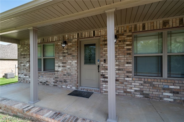 106 Stone Dr, Roland, OK 74954 - entrance to property with covered porch and brick siding