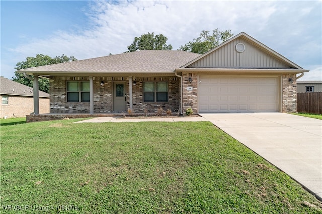 106 Stone Dr, Roland, OK 74954 - single story home with an attached garage, brick siding, and a front yard