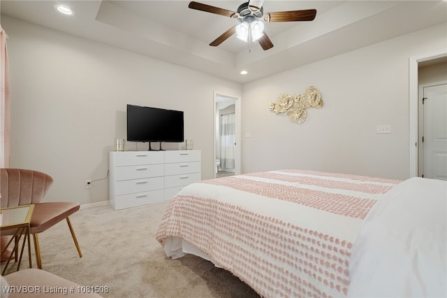 106 Stone Dr, Roland, OK 74954 - bedroom with light carpet, recessed lighting, a raised ceiling, and ceiling fan