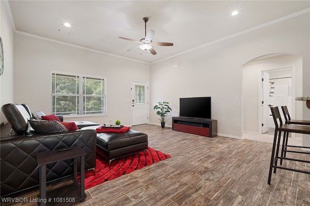 106 Stone Dr, Roland, OK 74954 - living room with arched walkways, ceiling fan, ornamental molding, wood finished floors, and recessed lighting