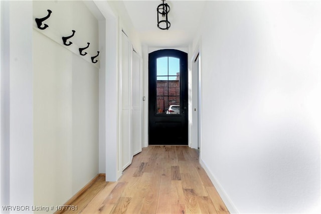 hallway with light wood-type flooring