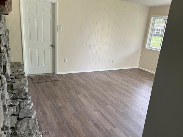 102 Gamma Cir, Roland, OK 74954 - empty room featuring baseboards and wood finished floors
