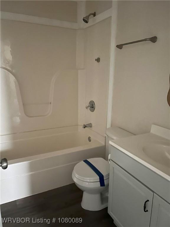 102 Gamma Cir, Roland, OK 74954 - bathroom with vanity,  shower combination, and toilet