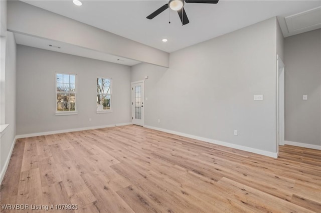 unfurnished room featuring light wood-type flooring, visible vents, a ceiling fan, recessed lighting, and baseboards