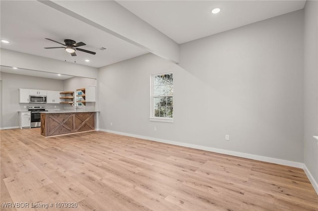 unfurnished living room featuring recessed lighting, light wood-type flooring, baseboards, and ceiling fan