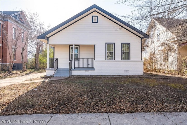 bungalow-style home featuring crawl space and a porch