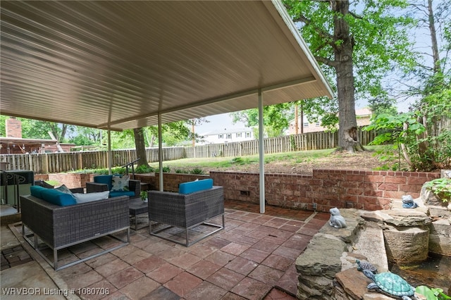 view of patio featuring a fenced backyard and an outdoor hangout area