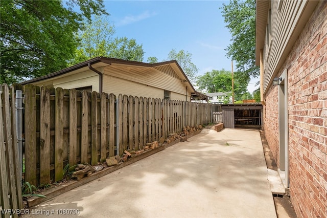 exterior space with a fenced backyard