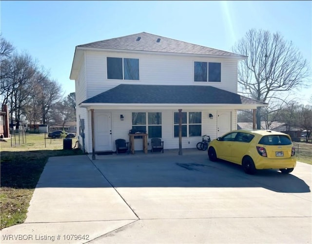 518 N Coker St Unit A & B, Greenwood, AR 72936 - view of front facade with a shingled roof