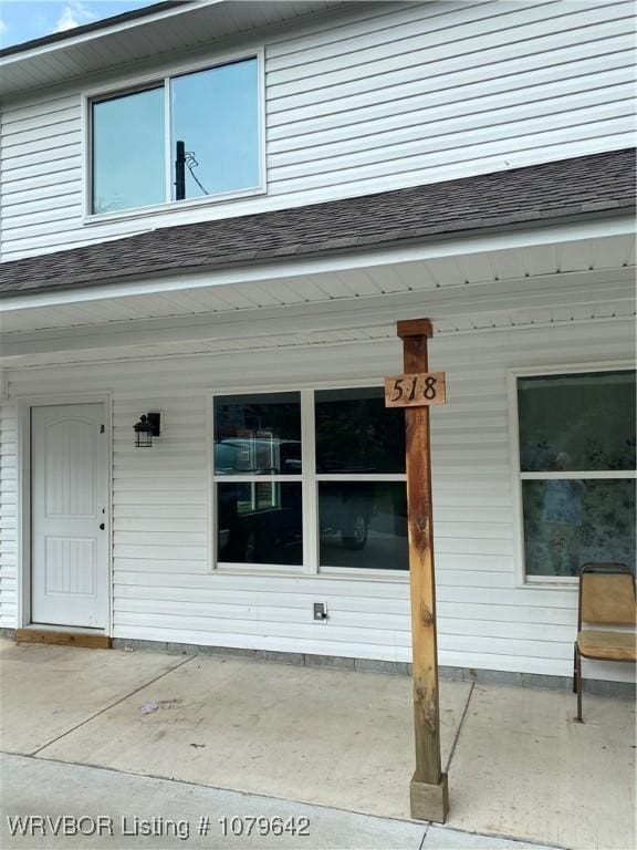518 N Coker St Unit A & B, Greenwood, AR 72936 - property entrance with a shingled roof