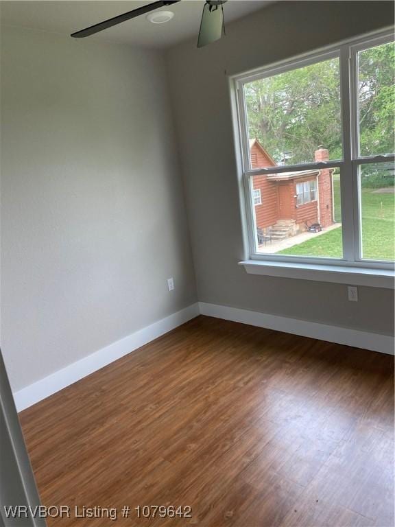 518 N Coker St Unit A & B, Greenwood, AR 72936 - empty room featuring baseboards, wood finished floors, and ceiling fan